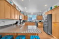 Your fully equipped kitchen sparkles with granite countertops, stainless-steel appliances, and abundant cabinet space—perfect for preparing memorable meals during your stay.